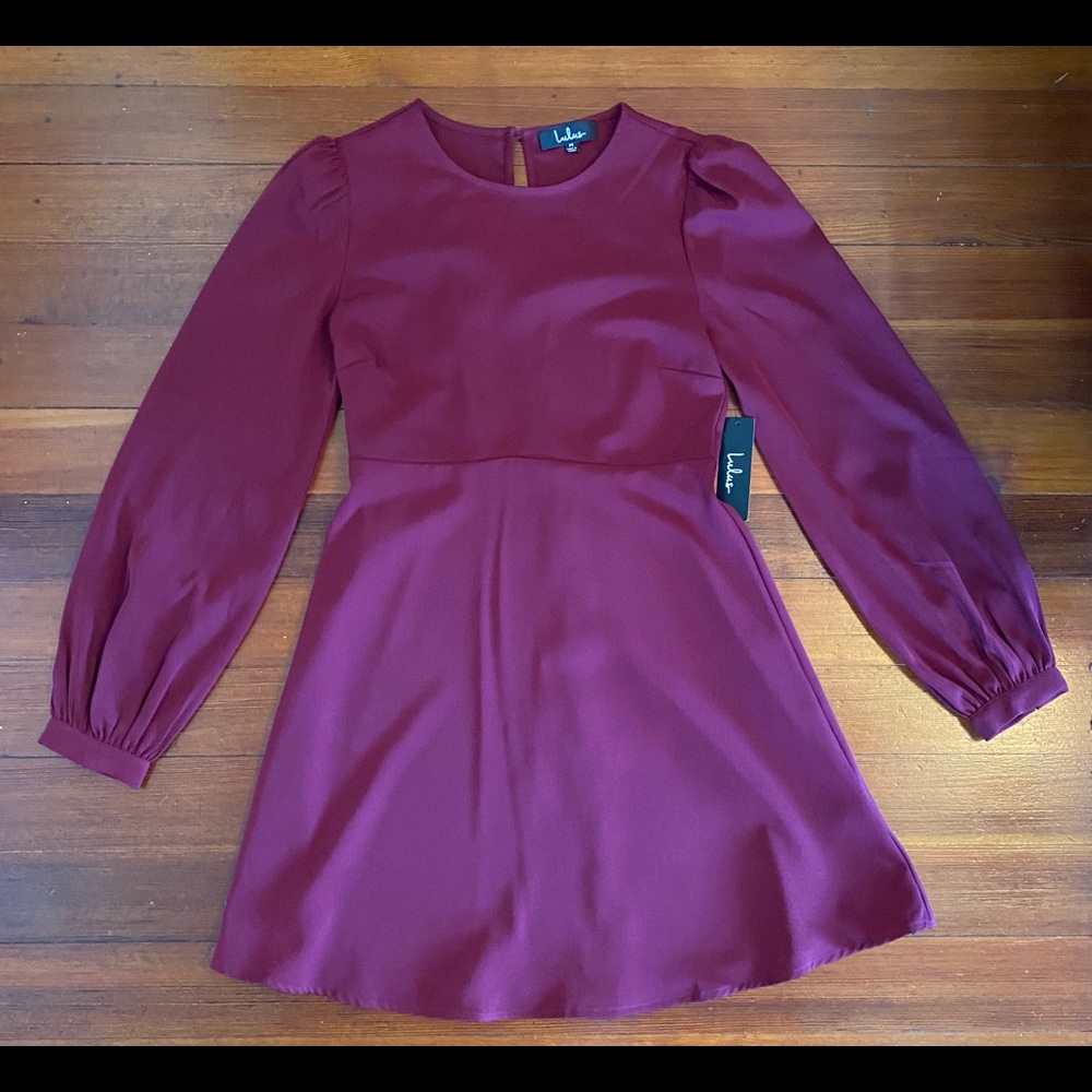 Lulu’s burgundy puff shoulder long sleeve dress.